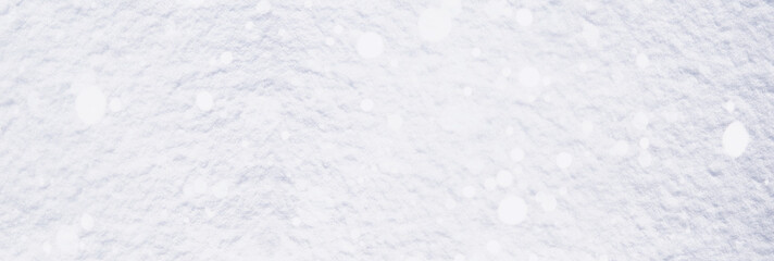 Obraz premium The texture of the snow. Winter rainfall. Tracks on a snowy road after a snowfall.