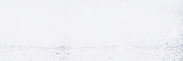 The texture of the snow. Winter rainfall. Tracks on a snowy road after a snowfall.