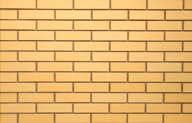  brick wall of new yellow bricks