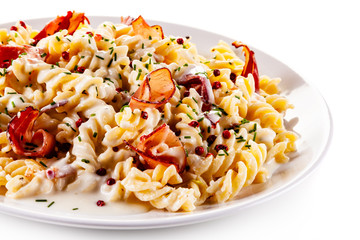 Pasta carbonara on white background