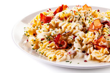 Pasta carbonara on white background