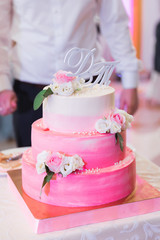 Pink and White Wedding Cake with Roses