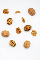 Walnuts isolated on white backgroun from top view.