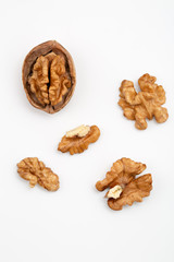 Walnuts isolated on white backgroun from top view.