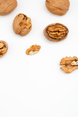 Walnuts isolated on white backgroun from top view.