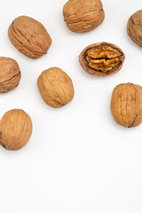 Walnuts isolated on white backgroun from top view.