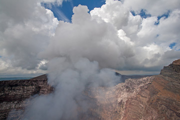 Fototapeta na wymiar Masaya Volcano emitting large quantities of sulfur dioxide gas from active Santiago crater in Masaya, Nicaragua, Central America.
