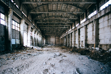 Old broken empty abandoned industrial building interior
