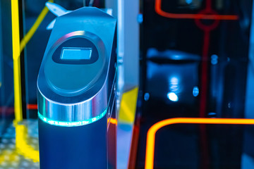 Contactless payment acceptance in public transport. Bus receiving system. Payment by bus by card. Cashless payment. Turnstile. Carriage of passengers. Municipal public transport.