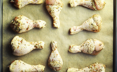 Baked chicken in the oven. Turkey legs on a baking sheet with spices baked in the oven. Snack on...