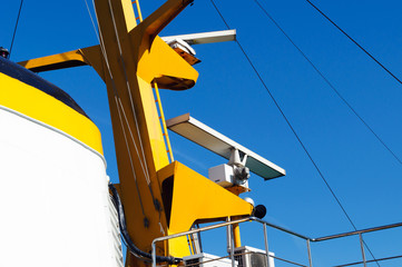 Navigation radar on the mast of a passenger ship.