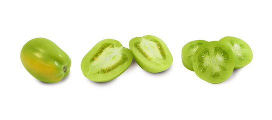 Green unripe tomato, whole, halves and slices isolated on white background side view