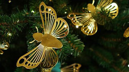 Christmas decorations on the Christmas tree. Butterfly.