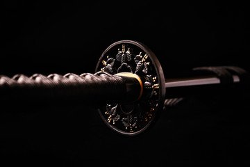 Wakizashi Sword on black background. (Close up)