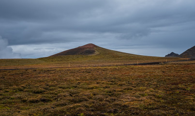 Frozen lavas field in the geothermal valley Leirhnjukur, near Krafla volcano. Location: valley Leirhnjukur, Myvatn region, North part of Iceland, Europe. September 2019