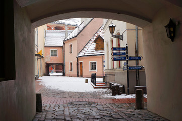 Medieval street in Old Town of Riga city, Latvia in winter.