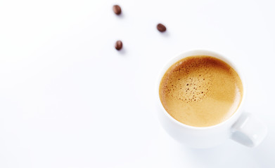 Fototapeta premium Cup of coffee on white background. Copy space.