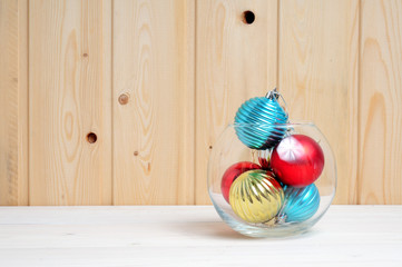 Christmas and New Year's toys in a glass aquarium