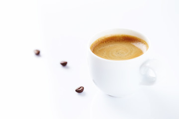 Cup of coffee on white background.  Copy space.