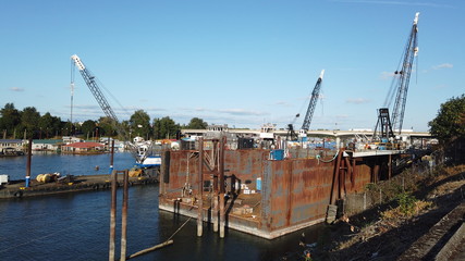 Fototapeta na wymiar Industrial area along the Columbia River. Hayden Island, Portland, OR