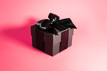Box Wrapped in Satin Ribbon on Pink