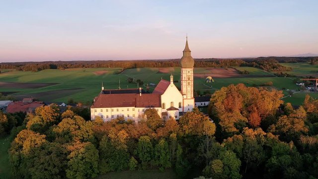 Flight at Andechs Monastery, aerial view at sunrise, Ammersee, F&uuml;nfseenland, Pfaffenwinkel, Upper Bavaria, Bavaria, Germany,