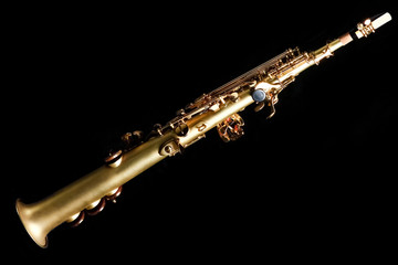 soprano saxophone on black background