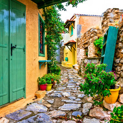 Fototapeta na wymiar Typical streets of old traditional villages of Greece - Alonissos island, Chora village. Sporades