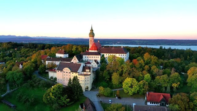 Flight at Andechs Monastery, aerial view at sunrise, Ammersee, F&uuml;nfseenland, Pfaffenwinkel, Upper Bavaria, Bavaria, Germany,