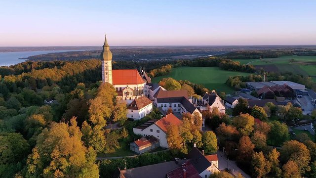 Flight at Andechs Monastery, aerial view at sunrise, Ammersee, F&uuml;nfseenland, Pfaffenwinkel, Upper Bavaria, Bavaria, Germany,