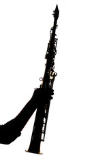 saxafon on a white background in the hands of a musician silhouette