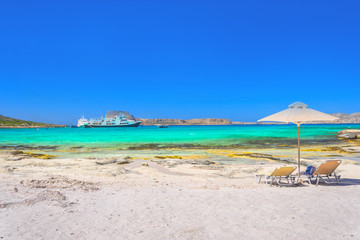 Amazing view of Balos Lagoon withmagical turquoise waters, lagoons, tropical beaches of pure white sand and Gramvousa island on Crete, Greece