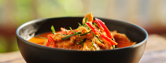 thai panang curry in bowl with pork