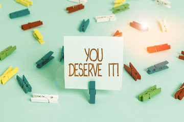 Writing note showing You Deserve It. Business concept for should have it because of their qualities...