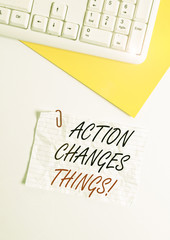 Text sign showing Action Changes Things. Business photo showcasing start doing something against problem resolve or achieve it Flat lay above white blank paper with copy space for text messages