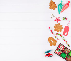 Christmas gingerbread cookies and decor on white background with copy space