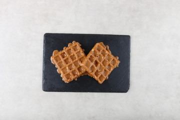 waffle with chocolate and pistachio an lotus biscuit and nutella