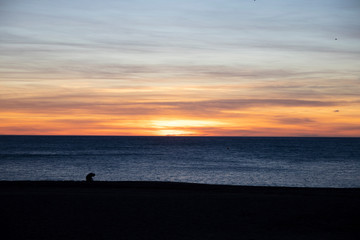 Naklejka na ściany i meble Sunrise on the beach with nice sky