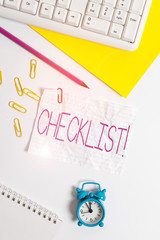 Handwriting text writing Checklist. Conceptual photo list items required things be done or points considered Flat lay above white blank paper with copy space for text messages