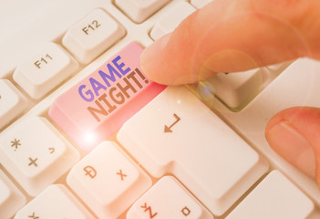 Writing note showing Game Night. Business concept for usually its called on adult play dates like...