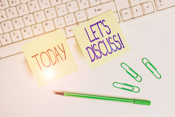 Word writing text Let S Discuss. Business photo showcasing asking someone to talk about something with demonstrating or showing Square green note paper with pencil on the white background