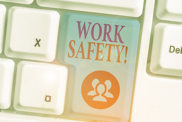 Writing note showing Work Safety. Business concept for policies and procedures in place to ensure health of employees