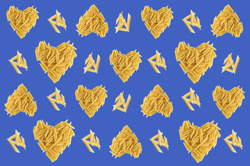 Pattern with pasta on a purple bright background. Heart shaped pasta. Favorite Pasta