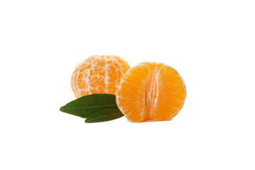 Peeled tangerines with green leaves isolated on a white background.