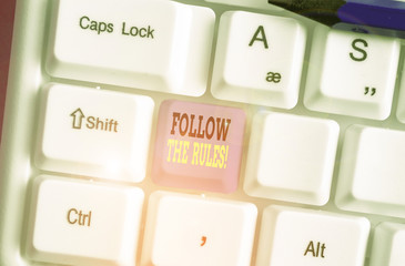 Handwriting text Follow The Rules. Conceptual photo go with regulations governing conduct or...