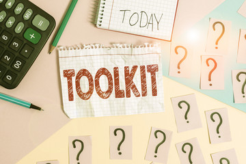 Conceptual hand writing showing Toolkit. Concept meaning set of tools kept in a bag or box and used for a particular purpose Mathematics stuff and writing equipment on pastel background