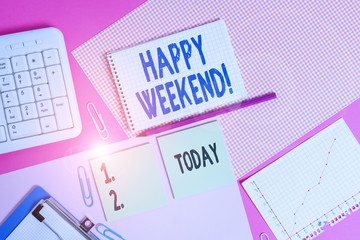 Conceptual hand writing showing Happy Weekend. Concept meaning something nice has happened or they feel satisfied with life Writing equipments and computer stuffs placed on plain table