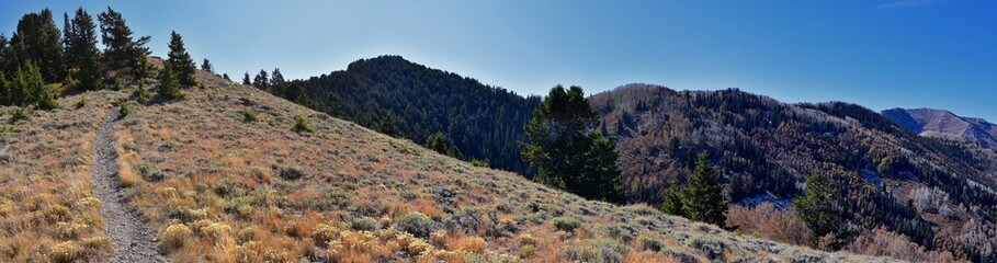 Butterfield canyon hiking path views of the Oquirrh range along the Wasatch Front Rocky Mountains, by Kennecott Rio Tinto Copper mine, Tooele and Salt Lake City fall. Utah, United States.