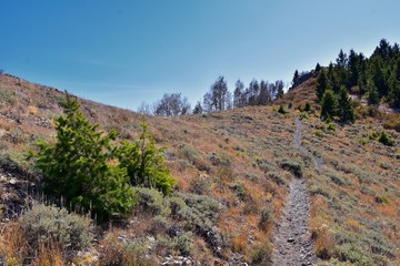 Butterfield canyon hiking path views of the Oquirrh range along the Wasatch Front Rocky Mountains, by Kennecott Rio Tinto Copper mine, Tooele and Salt Lake City fall. Utah, United States.