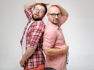 Men are measured by growth, they stood with their backs to each other as in childhood and are...